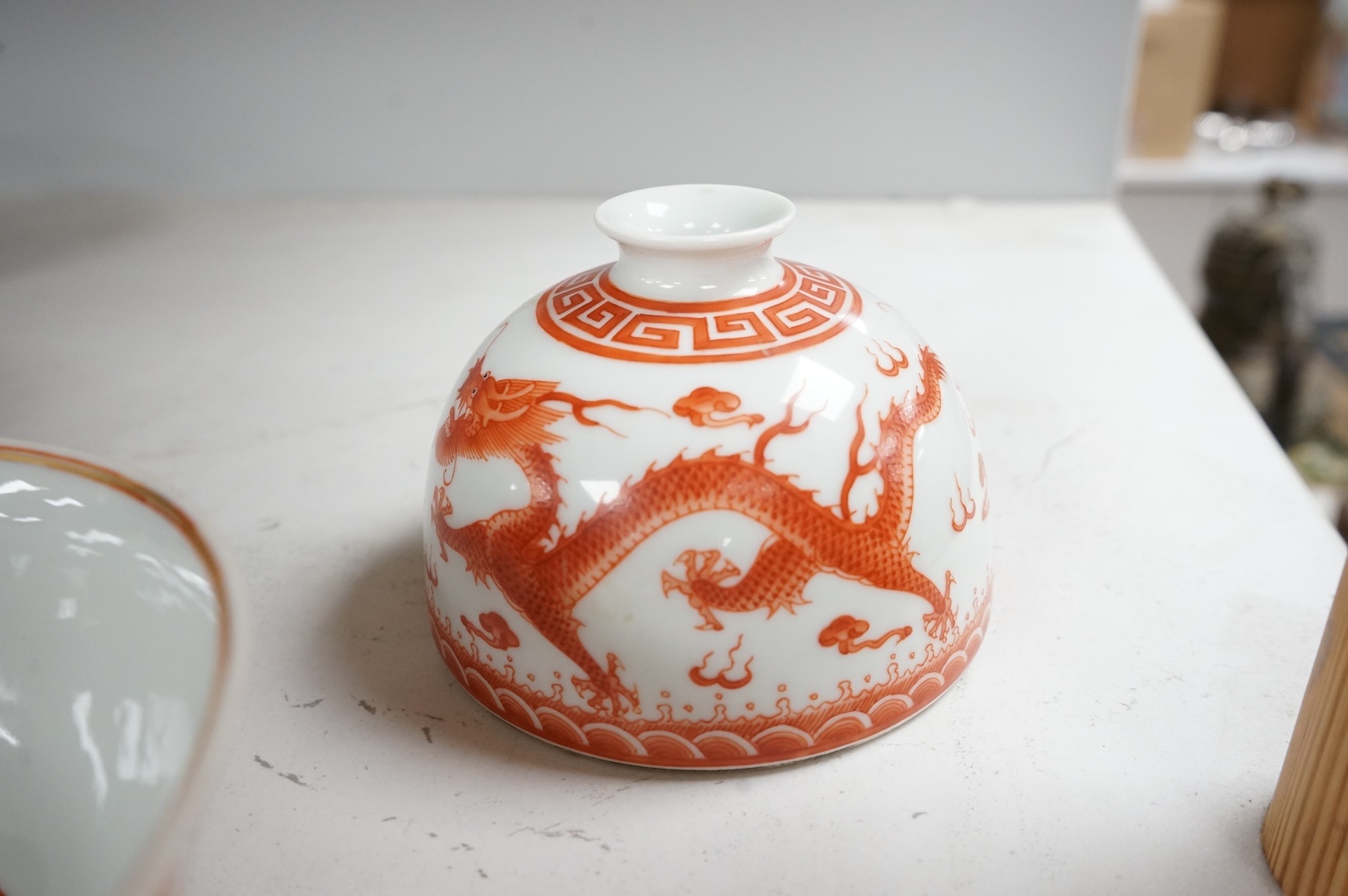 A Chinese rouge de fer dragon bowl, and a similar beehive water pot, Qianlong and Daoguang seal marks but later, bowl 15.5cm diameter